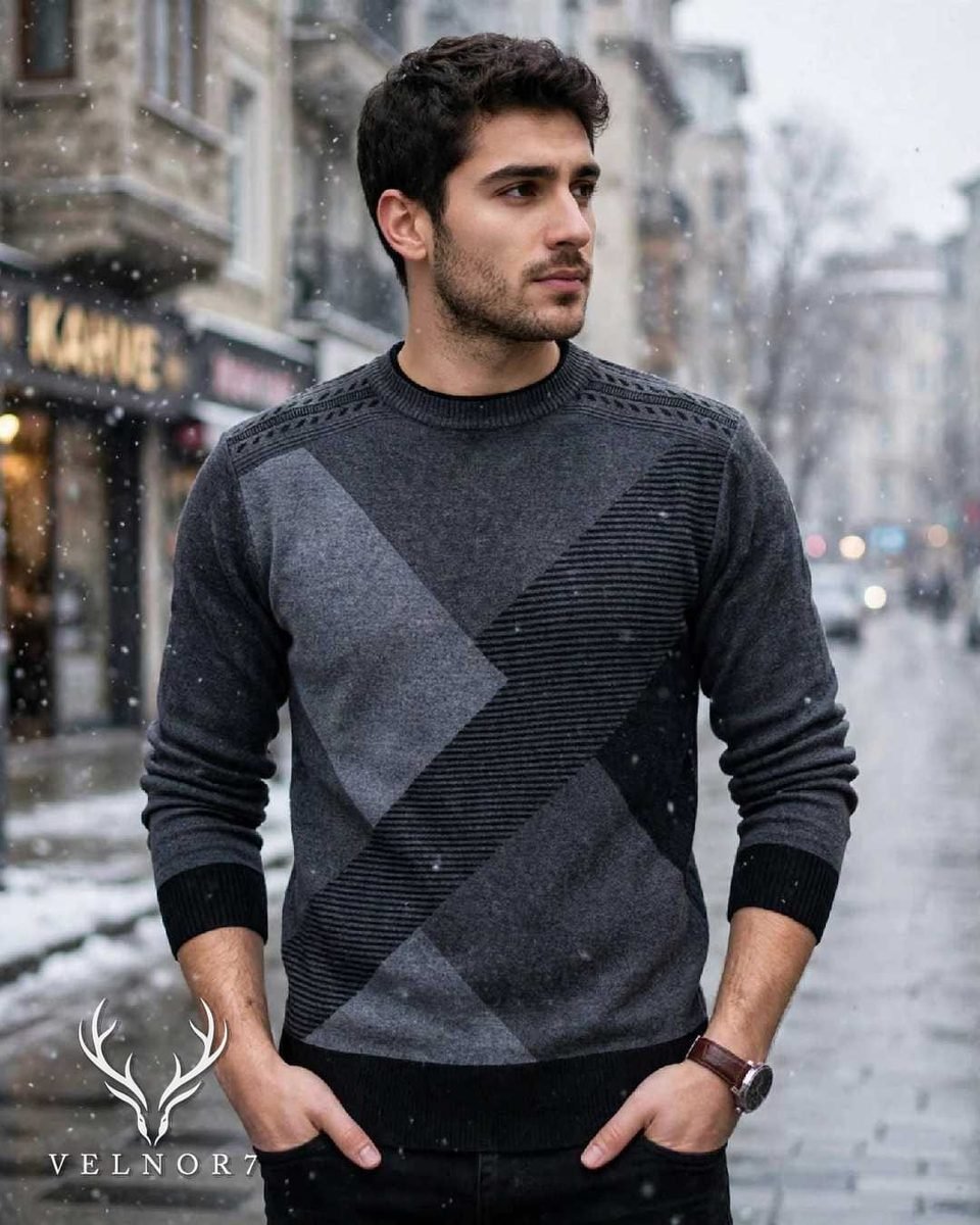 Model wearing the charcoal colourblock crew neck sweater on a snowy street